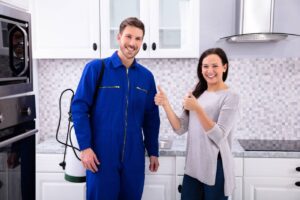 pest control specialist with customer